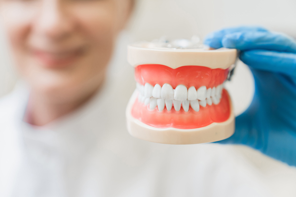 Signs You Need To Seek Professional Care For Your Dentures